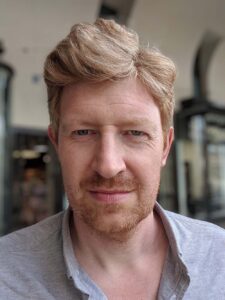 Headshot of Adam Bambrough