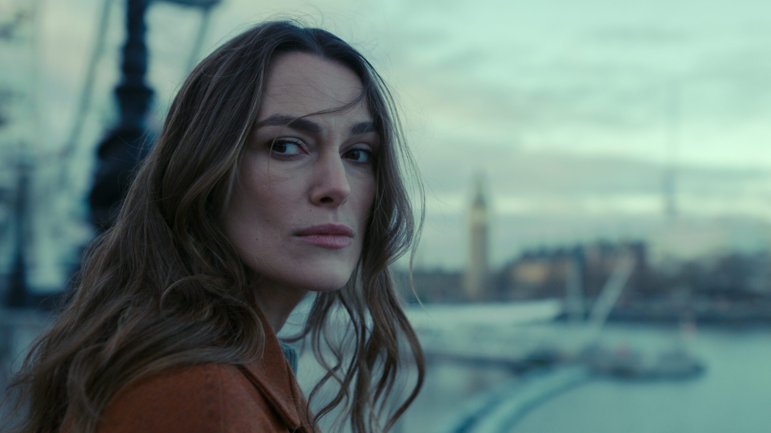 Keira Knightley looking worried in Black Doves (Season 1)