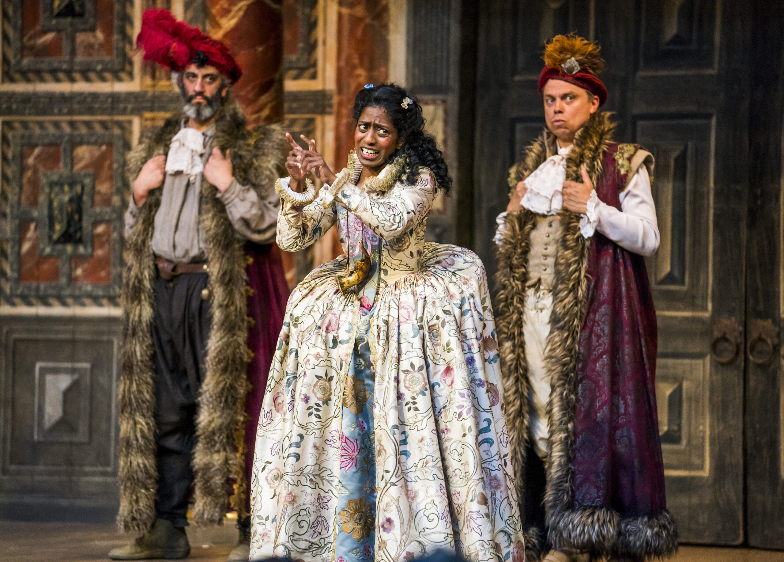 Nadia Nadarajah playing Celia in 'As You Like It' at Shakespeare's Globe, using sign language on stage