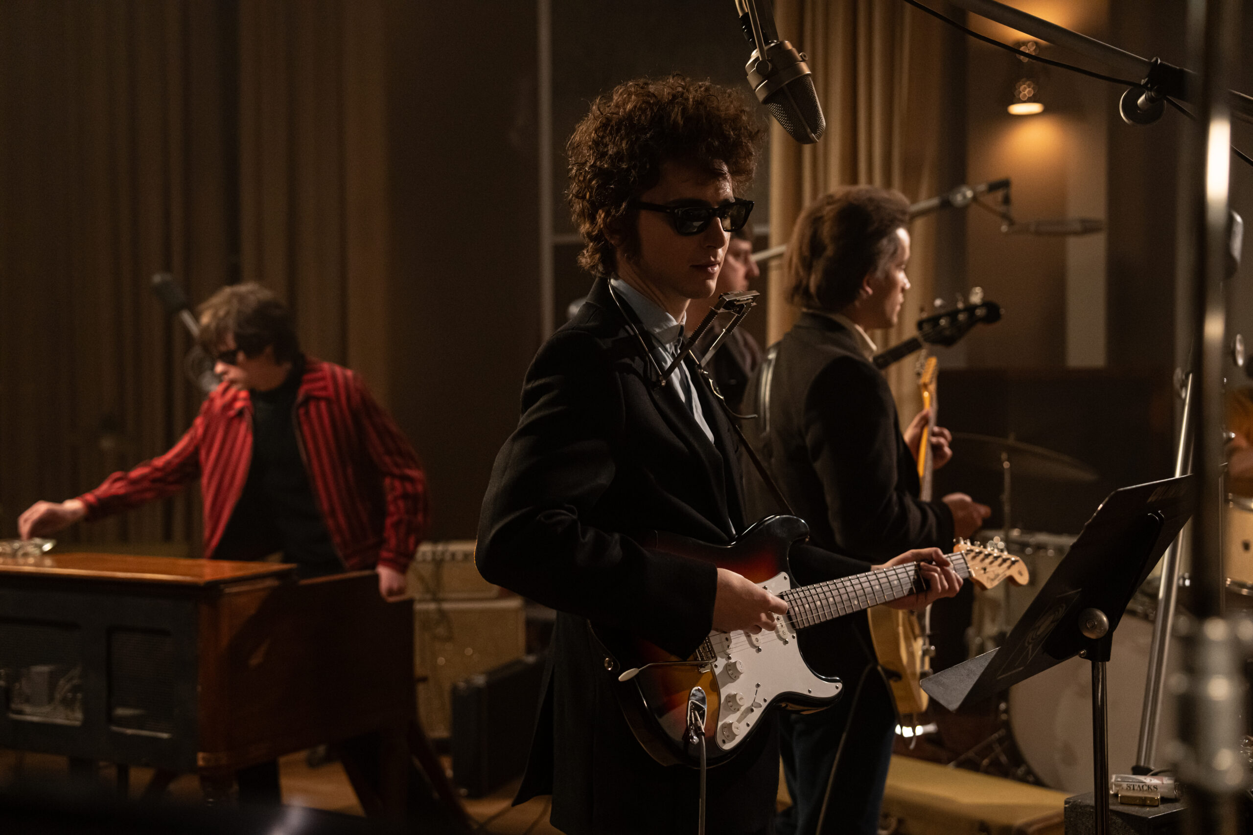 Timothée Chalamet as 'Bob Dylan' in a recording studio in the film 'A Complete Unknown'